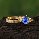 Elegant & Luxurious 5 prong Pear-Cut Sapphire Wedding Band Set